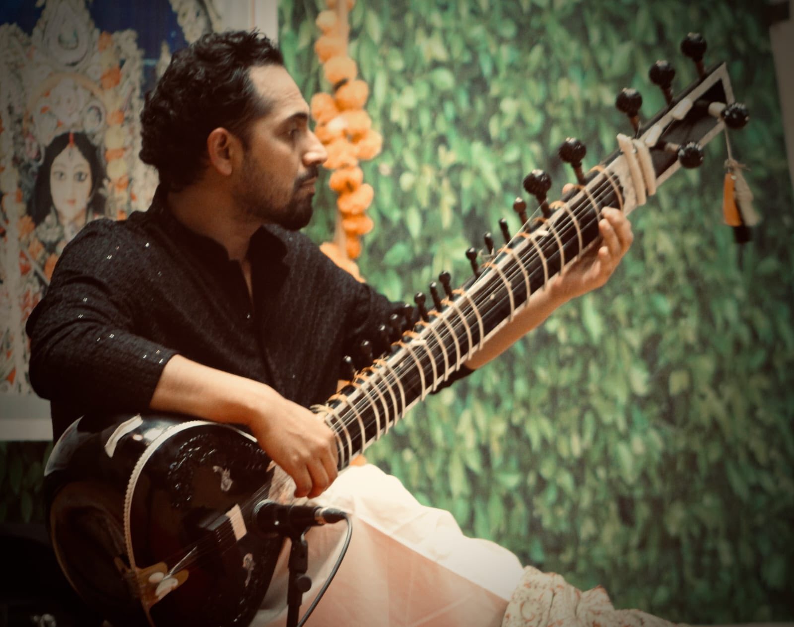 Dr. Samya Bhaduri performing sitar in concert